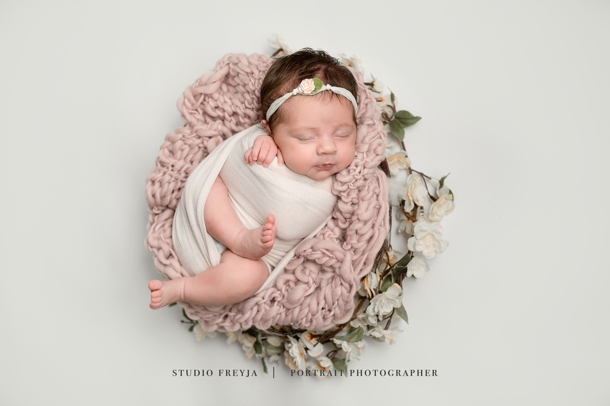 Floral Newborn Pictures by San Diego Newborn Photographer