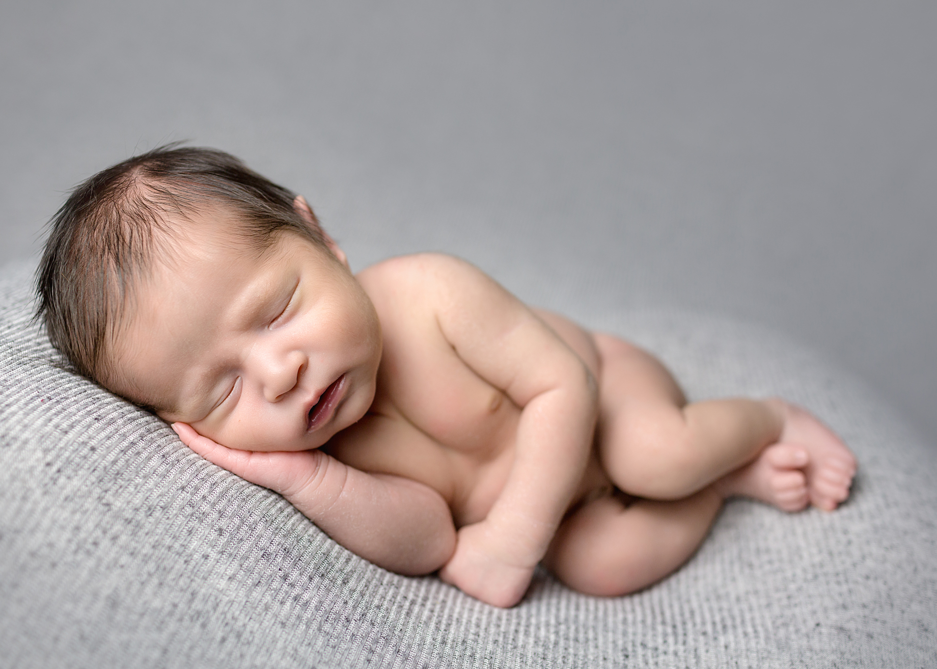 Sleeping Leo Newborn Photography Session by San Diego Newborn Photographer