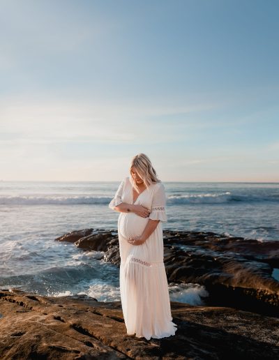 Portrait of pregnant mom during maternity pictures on San Diego Beach