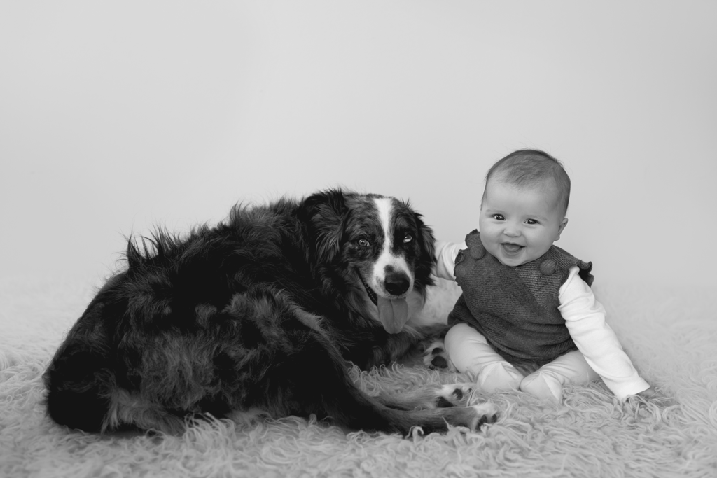 Baby girl and her dog during her Milestone session captured by Studio Freyja Newborns, a San Diego Kids Photographer