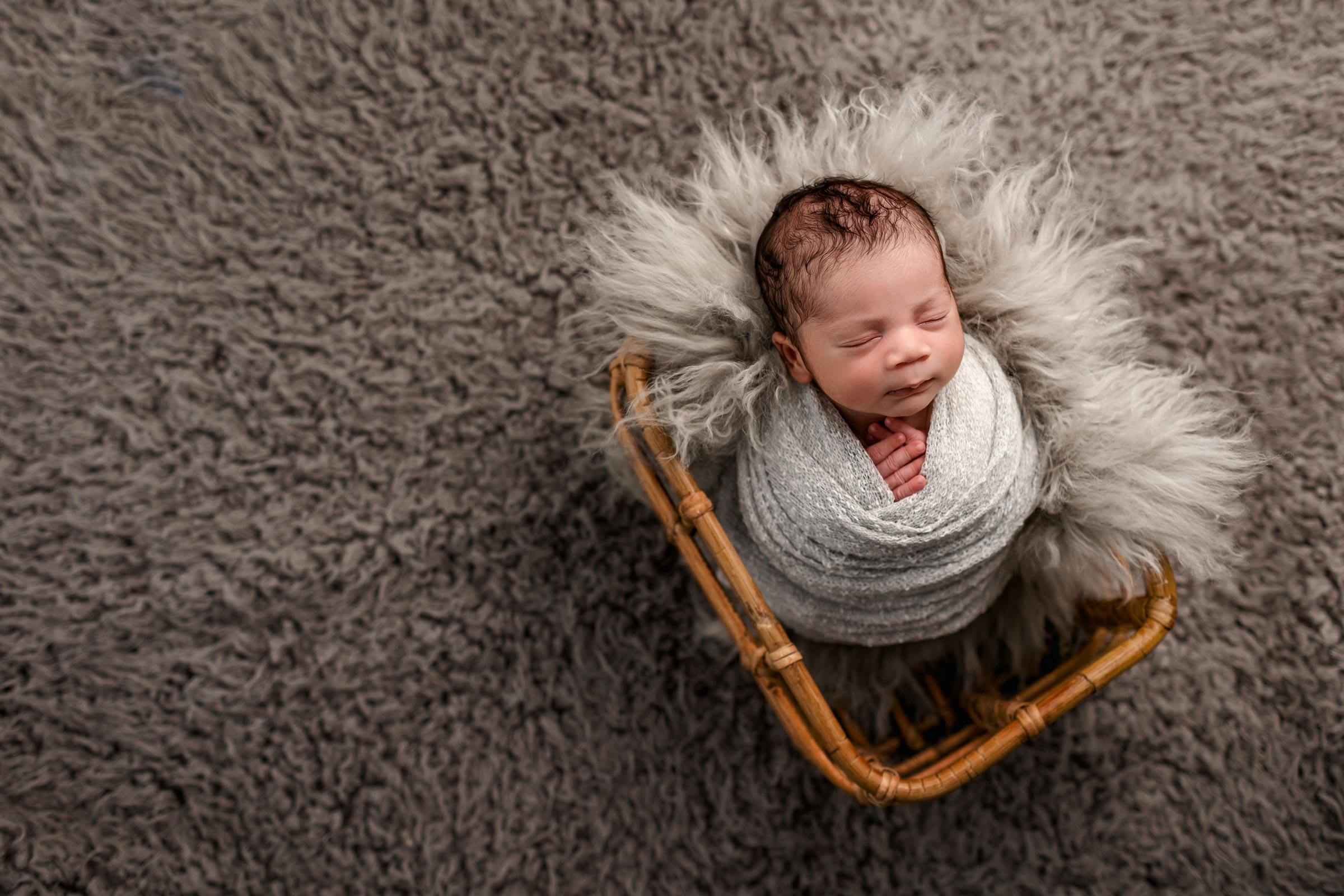 The Wicker Basket is another favorite newborn prop I use for newborn pictures