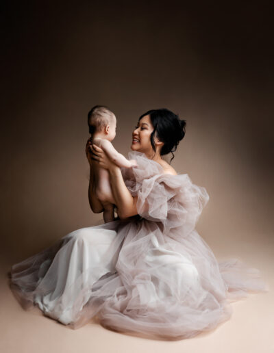 Mother's Day Mini Session Photo of mom holding up baby girl