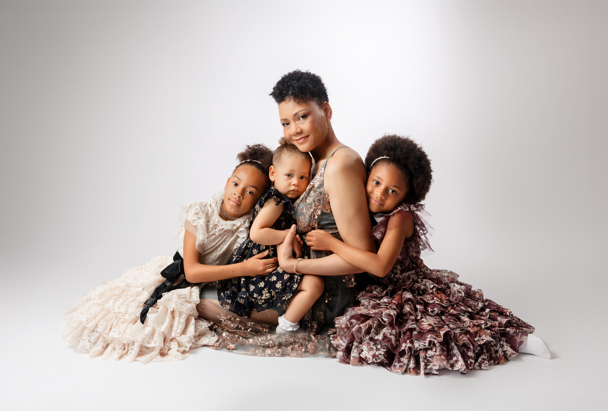 San Diego Portrait Photographer capturing precious moments of mome and her three girls during an empowerment shoot