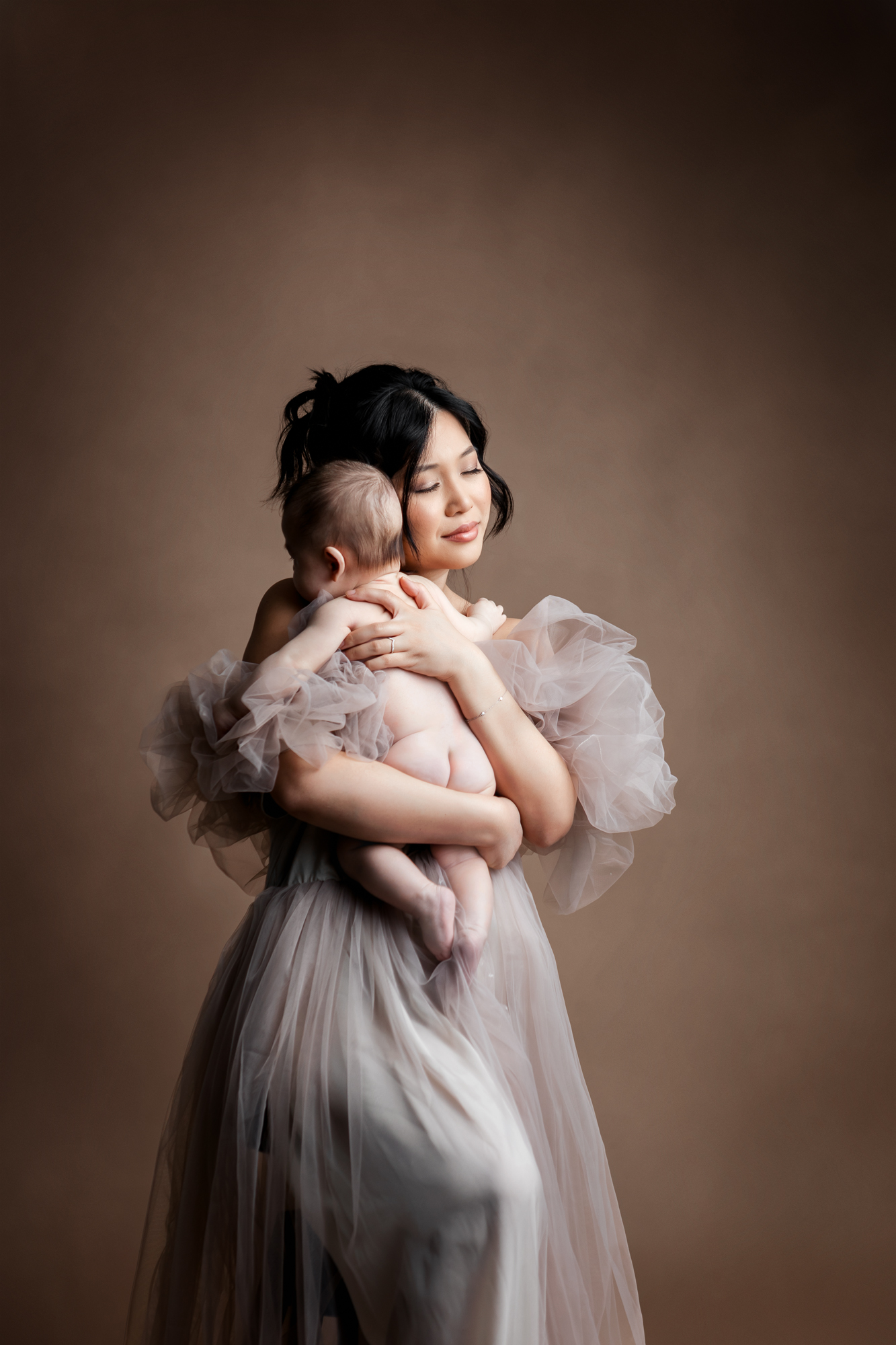 Luxurious empowerment portrait of woman in voluminous tulle dress