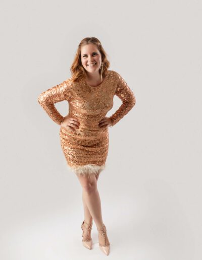 Gold short flirty dress for women empowerment portraits